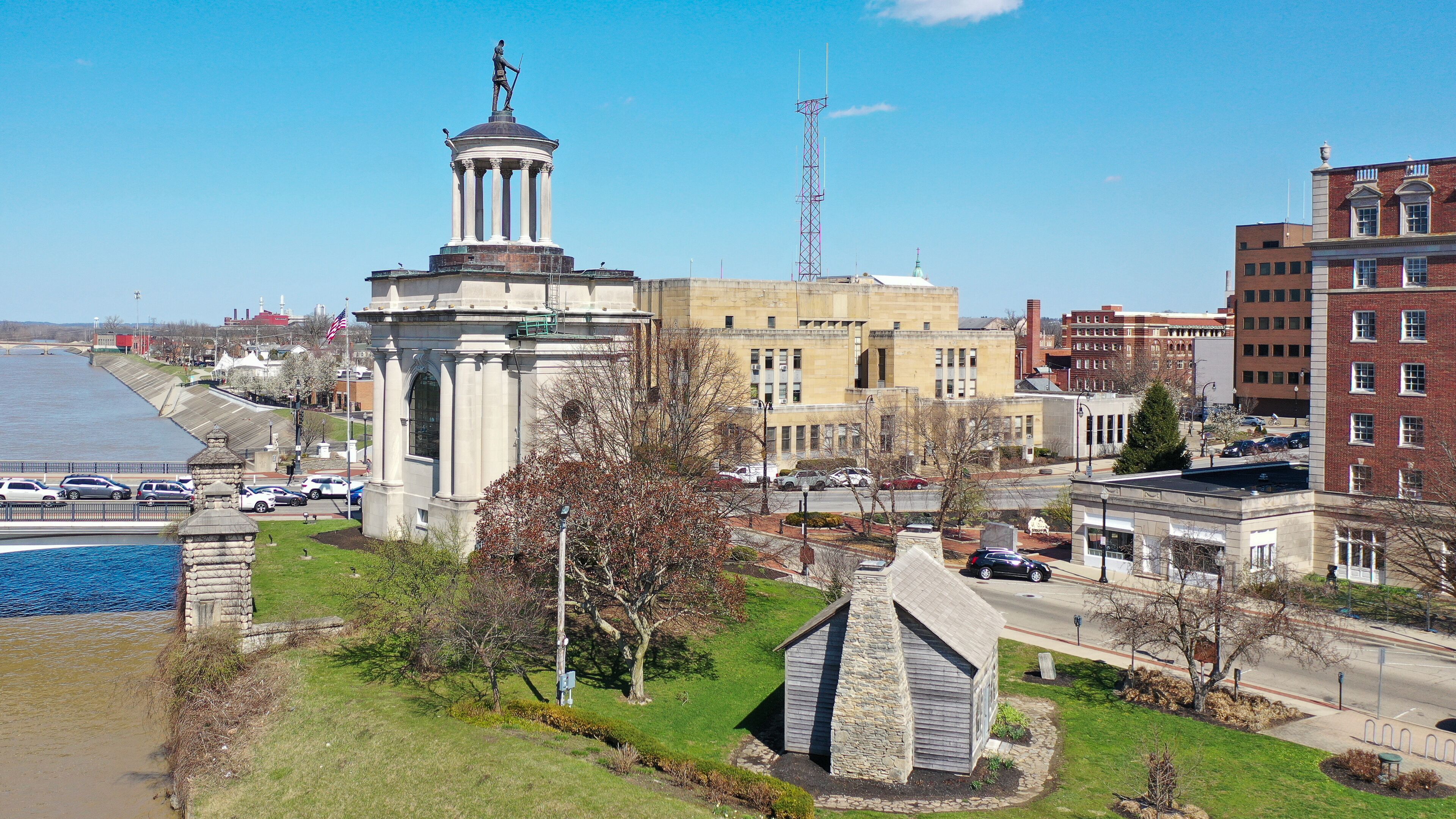 Civil War monument and log cabin