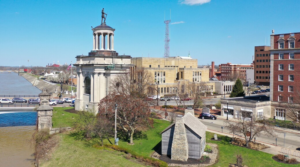 Civil War monument and log cabin