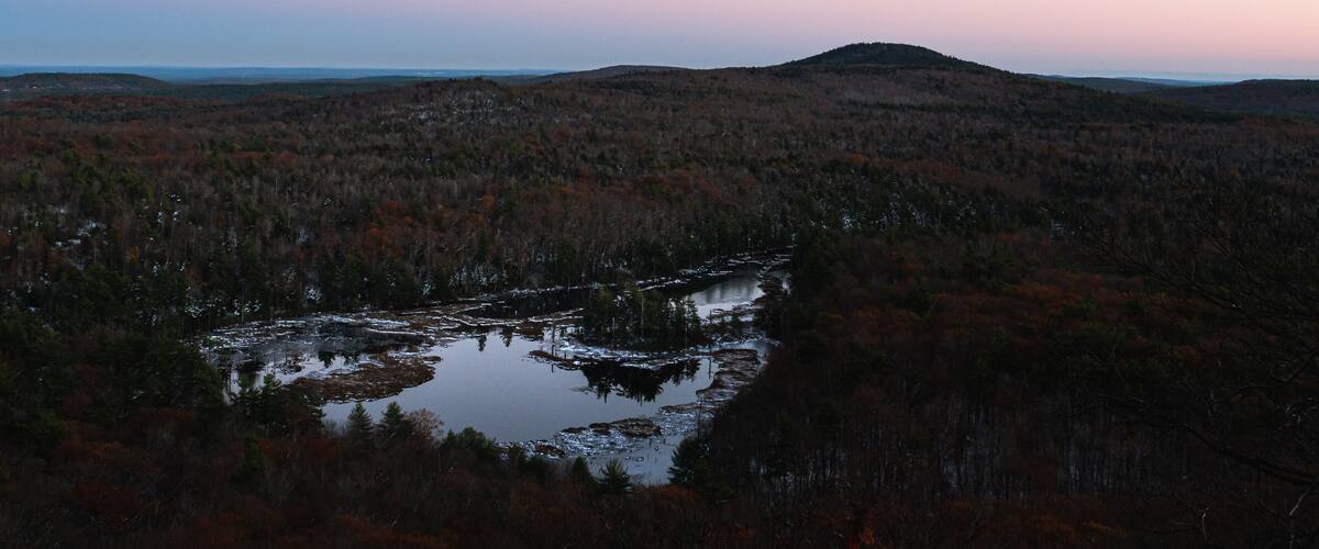 Twilight on Binney Pond as seen from Pratt Mountain on the Wapack Trail in New Ipswich New Hampshire
