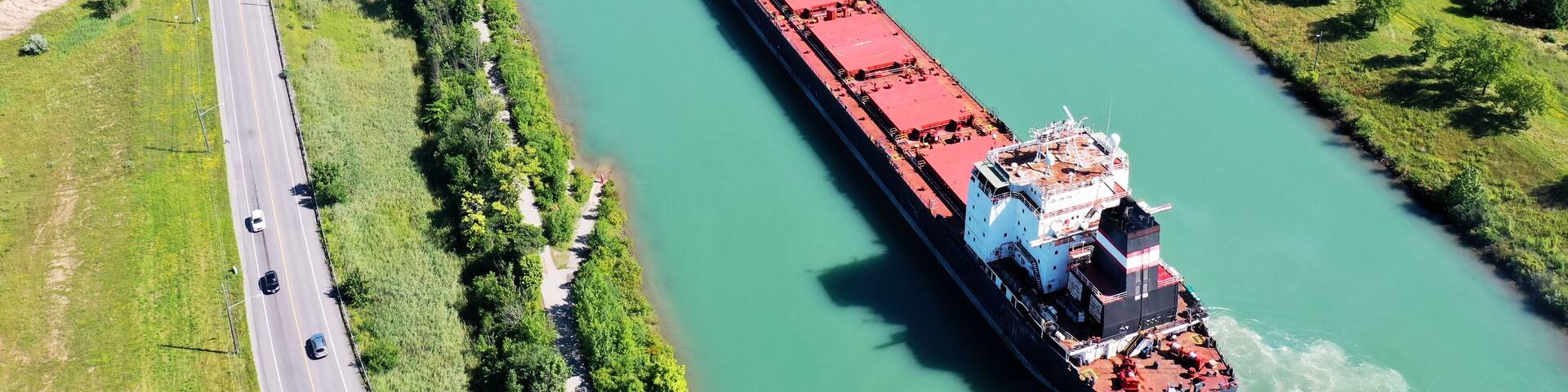 Aerial of a Lake Freighter sailing in the Welland Canal, Canada