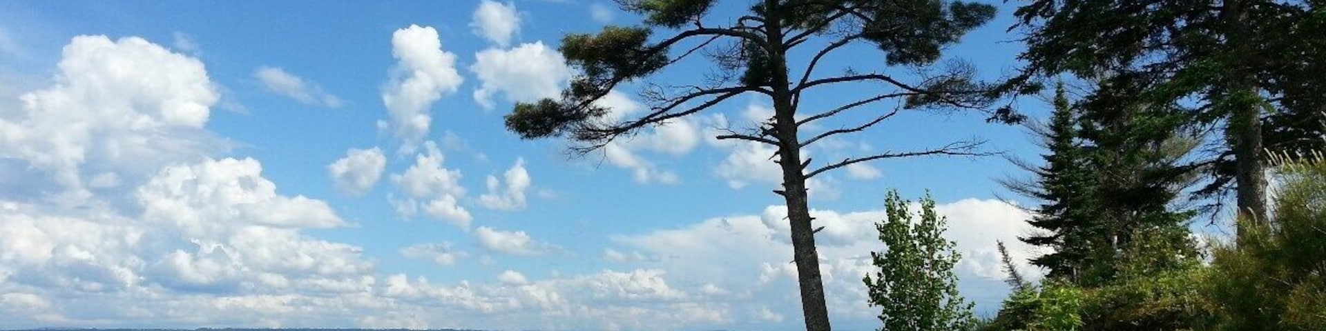 Driving along the bay at Baraga, you will find untouched natural beauty. Crisp air, bright sun, and the beautiful waters of Lake Superior. No salt! #puremichigan