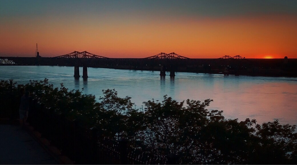 Sunset over the Mississippi River in Natchez, Mississippi. Bridge connecting Mississippi and Louisiana.