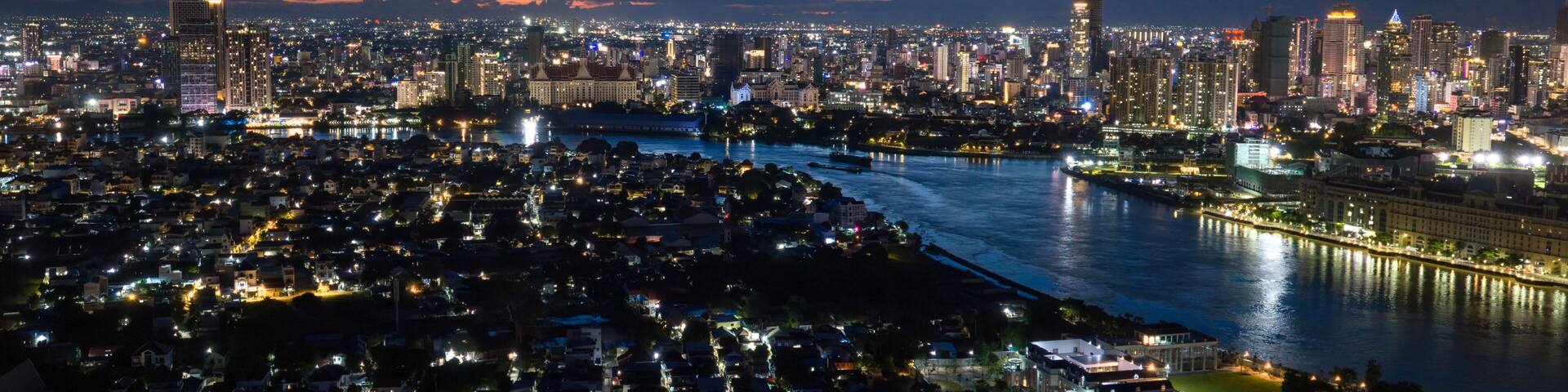 View of Phnom Penh, the capital of the Kingdom of Cambodia, at night. View from the Mekong River ban