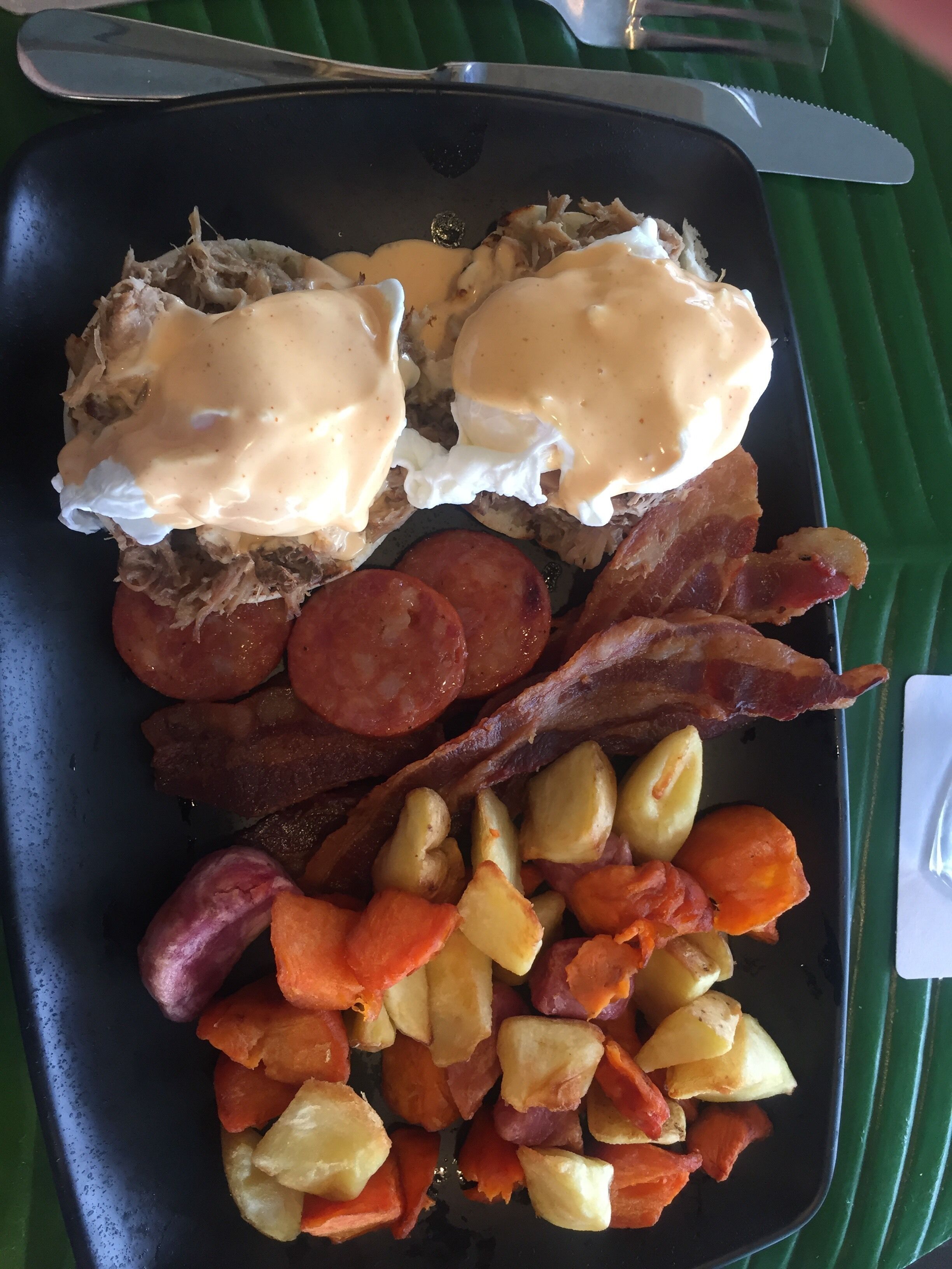 Thoroughly unhealthy breakfast. Pulled pork eggs benedict witj sides of bacon and sausage