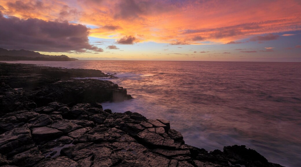 Beautiful sunrise on the southeast coast of Kaua’i. Taking during a family vacation here in June.