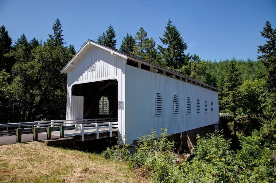 A wooden covered bridge around the Cottage Grove Area of Oregon USA America; Shutterstock ID 107914484
