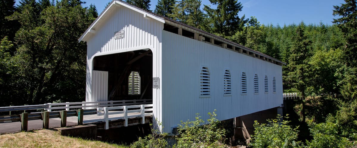 A wooden covered bridge around the Cottage Grove Area of Oregon USA America; Shutterstock ID 107914484