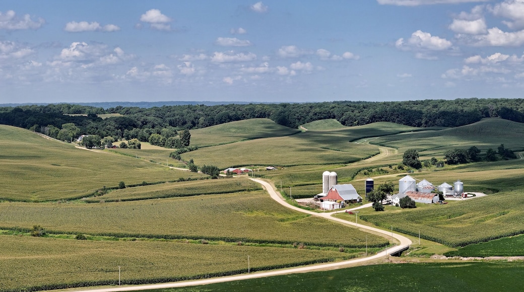 Farm fields panorama with homestead in the rolling hills of Northwest Illinois