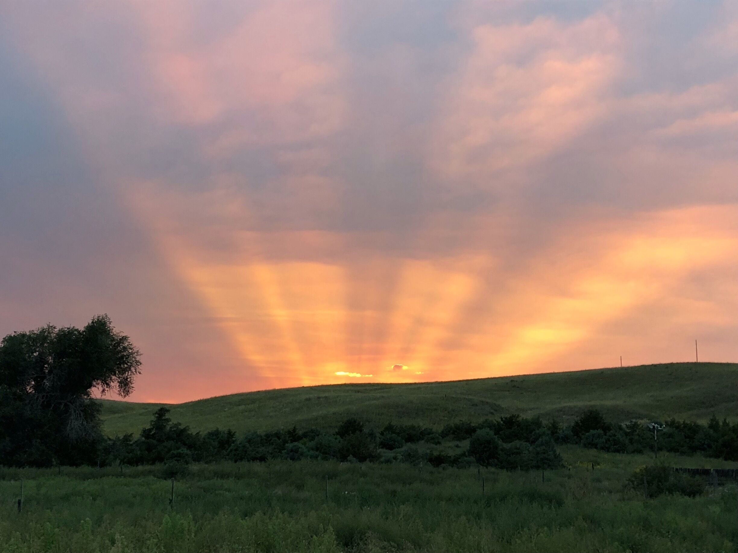 Great sunsets and green grass in the Nebraska Sandhills.