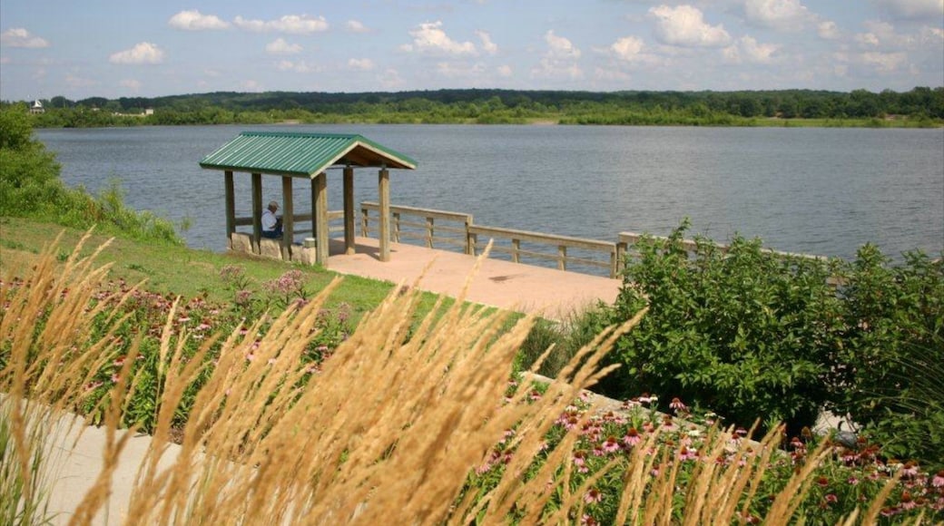 West Des Moines featuring a garden and a lake or waterhole
