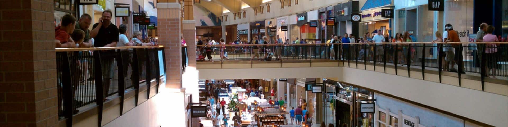West Des Moines showing interior views and shopping as well as a large group of people