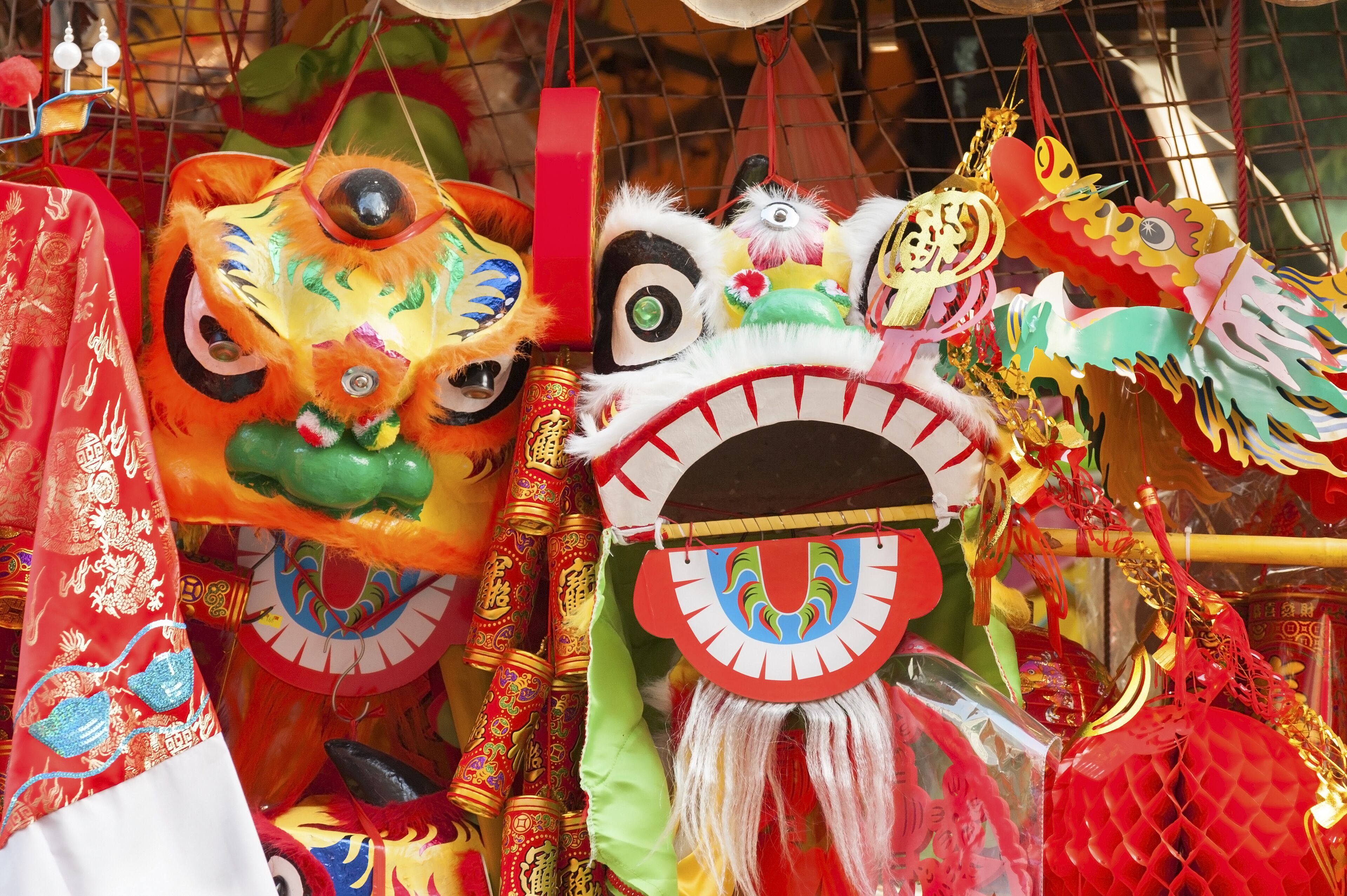 Traditional clothing and decoration stuffs are selling for Chinese New Year; Shutterstock ID 136290896