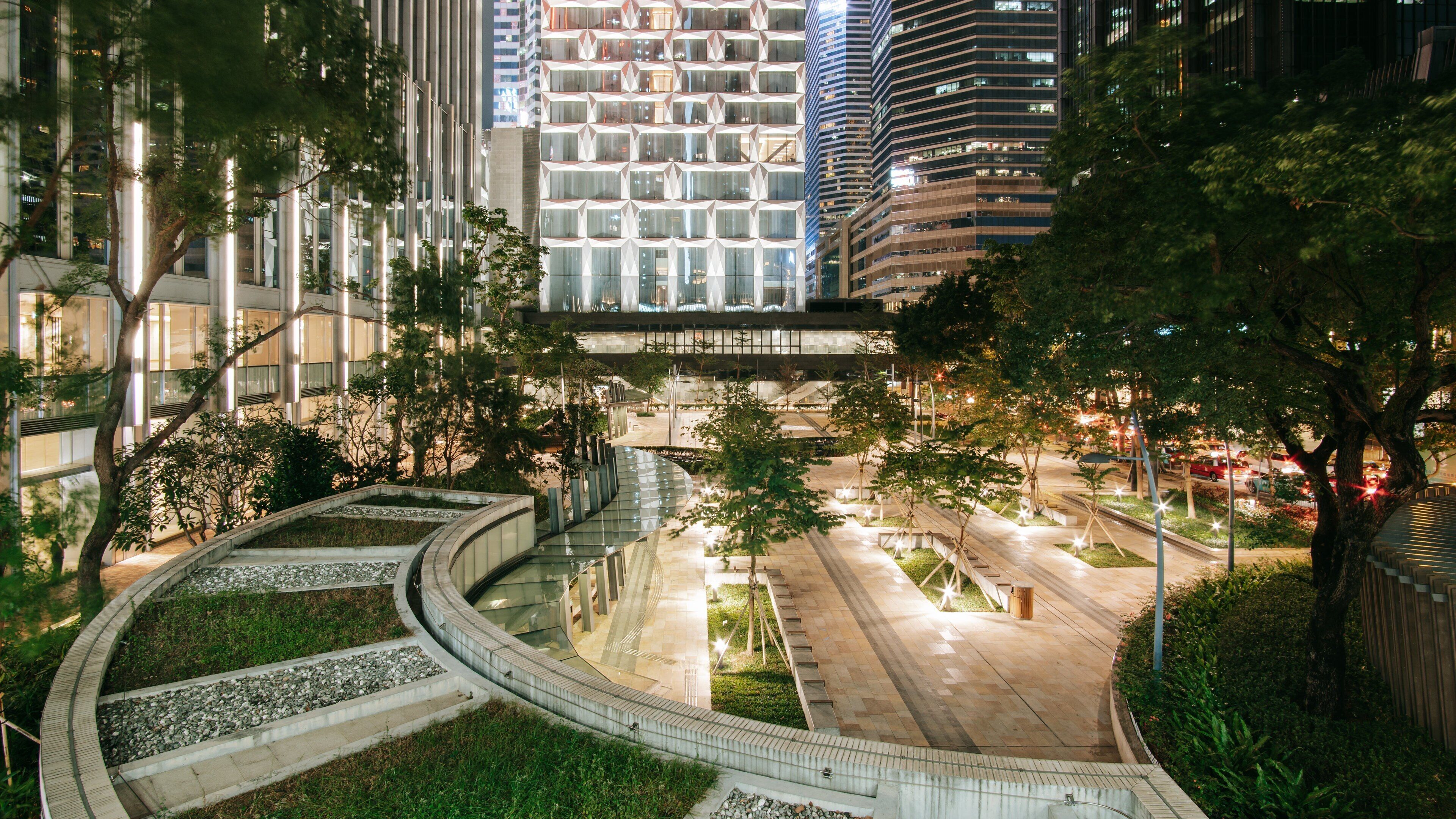 Wan Chai which includes a park, a city and night scenes