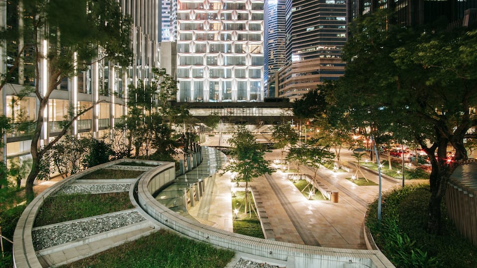 Wan Chai which includes a park, a city and night scenes