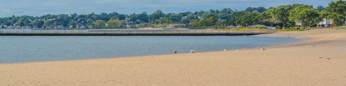 A pier on Sand Point Beach at New Haven Harbor on Long Island Sound. West haven in New Haven County, Connecticut
