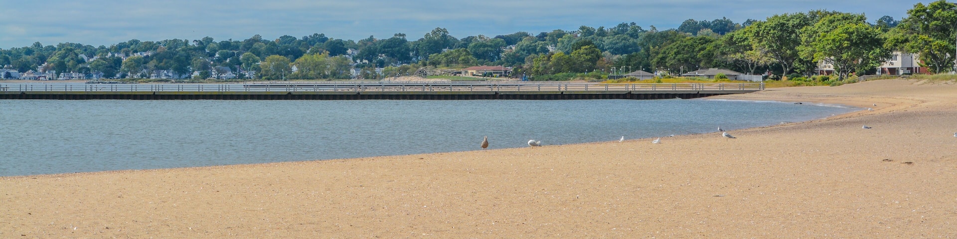 A pier on Sand Point Beach at New Haven Harbor on Long Island Sound. West haven in New Haven County, Connecticut
