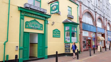 Holyhead which includes street scenes