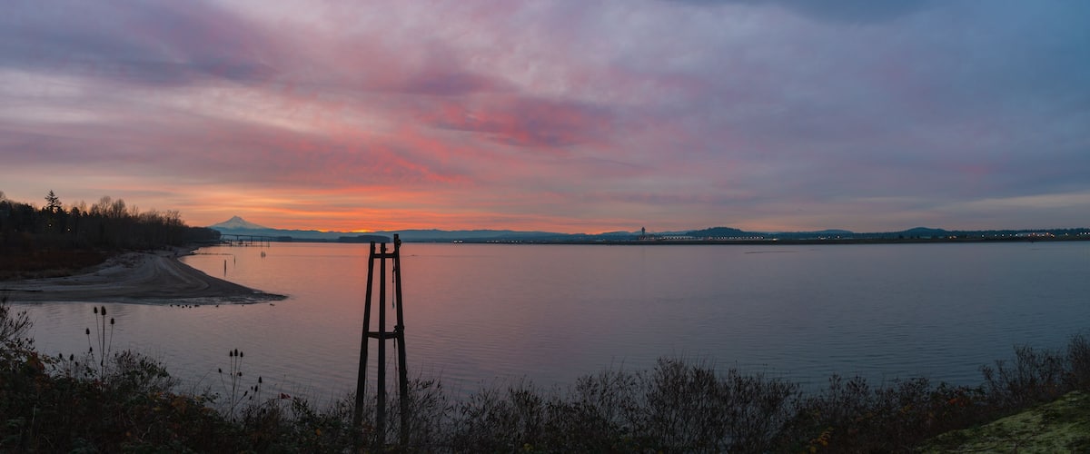 Panoramic sunrise landscape over Columbia River, Mt Hood, Portland Oregon, and Vancouver Washington, Pacific Northwest United States