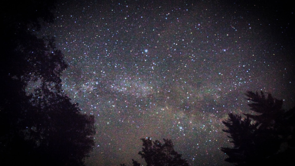 A starry night sky with visible stars and the Milky Way.