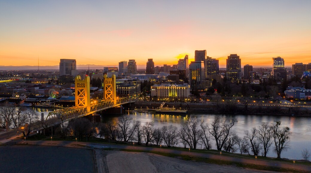 Aerial views of downtown Sacramento skyline and bridges.