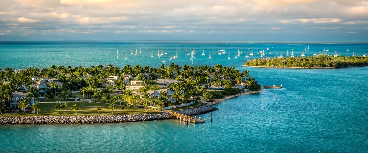 Panoramic sunrise landscape view of the small Islands Sunset Key and Wisteria Island of the Island of Key West, Florida Keys.