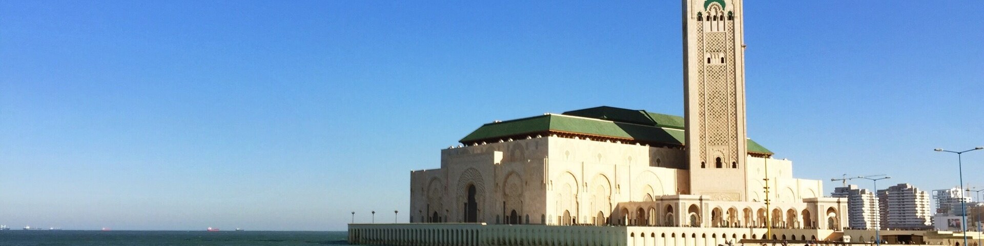 The Hassan II Grand Mosque is the largest mosque in Morocco and Africa and the 7th largest in the world. The mosque stands on a prominent piece of land that rises up on the shore of the Atlantic and provides visitors with the most spectacular views of the ocean. It was decided by King Hassan II that the mosque should be built on this location because of a verse found in the Qur'an, which says that God's throne was built over the water. #beach #Waterlust