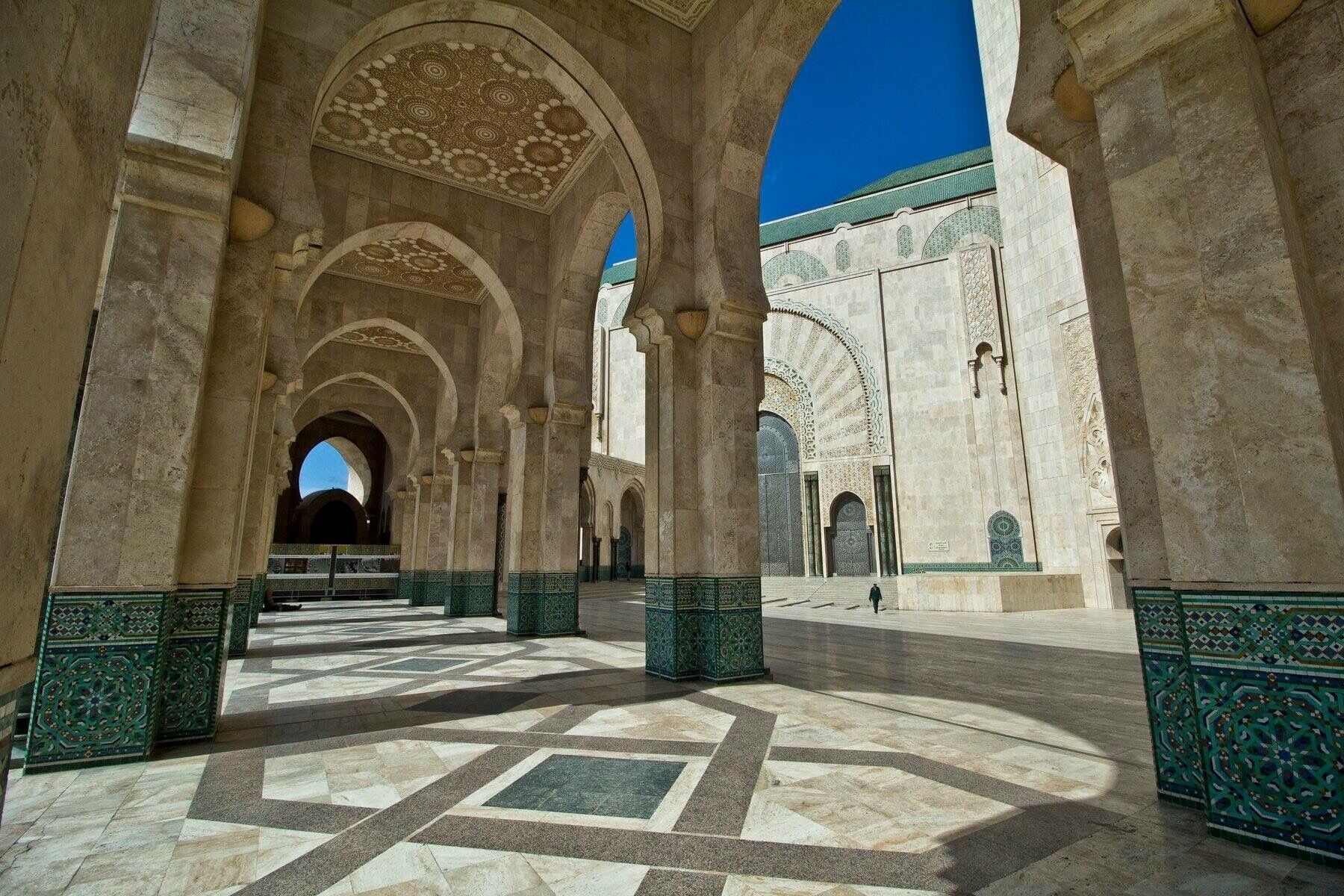 Biggest mosque in Casablanca was built on top of the water with a retractable roof allowing the sun shine inside the mosque.