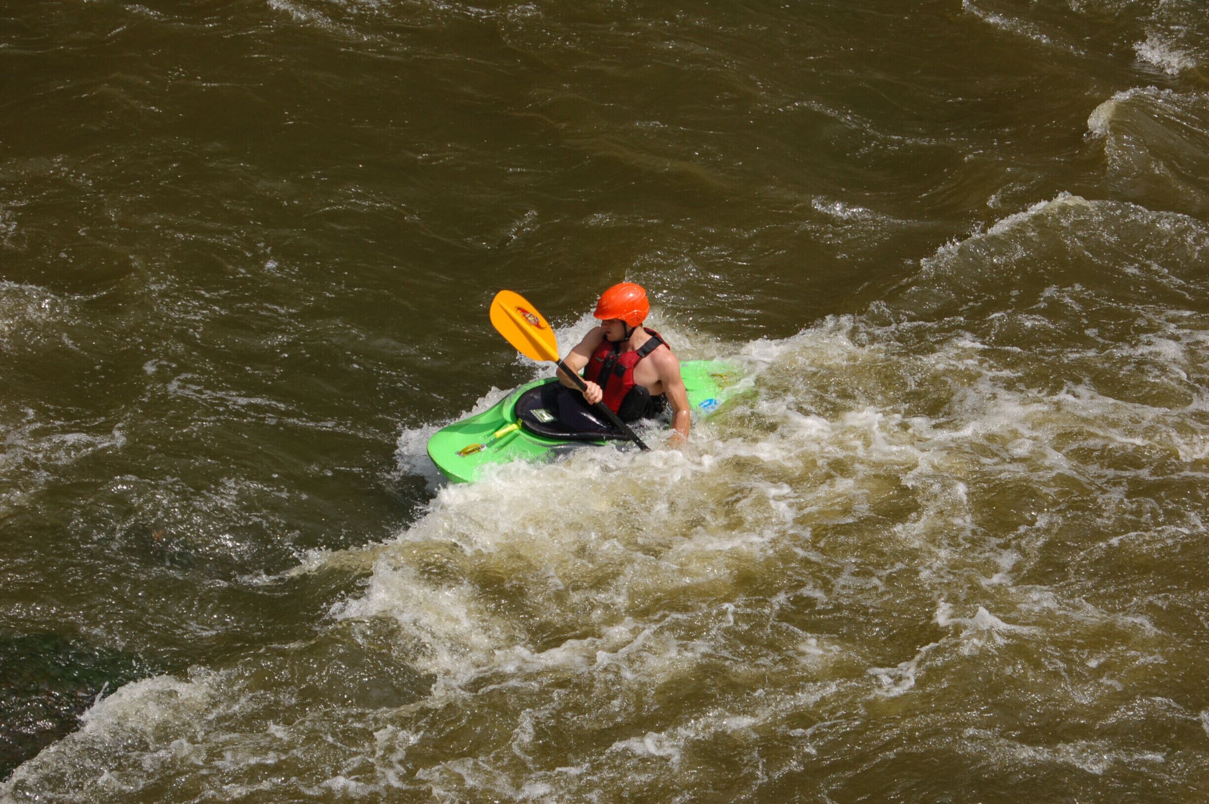 A man kayaking in the river at The Burntwood Tavern 2014.
