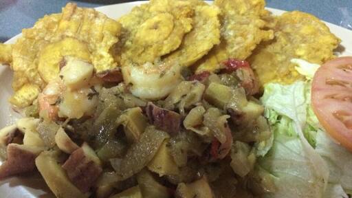 Sea food salad!! Conch, Shrimps, Octopus and Lobster with Tostones (Green Plantain) and Salad!