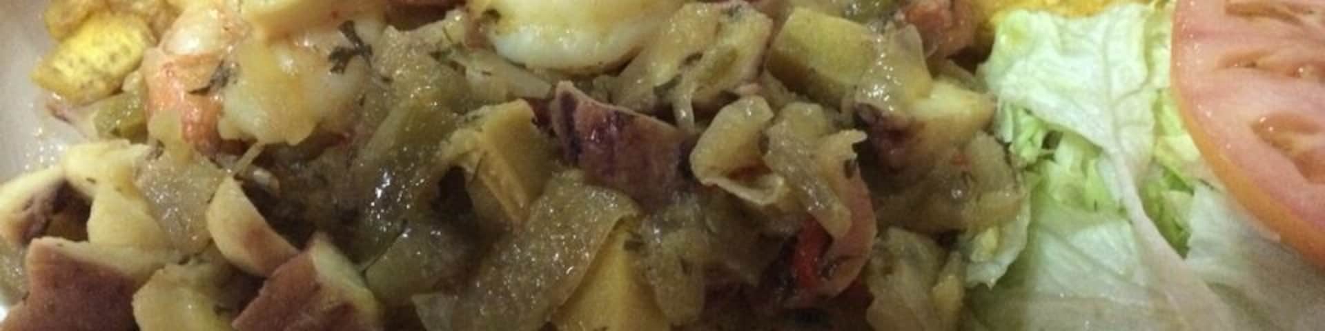 Sea food salad!! Conch, Shrimps, Octopus and Lobster with Tostones (Green Plantain) and Salad!