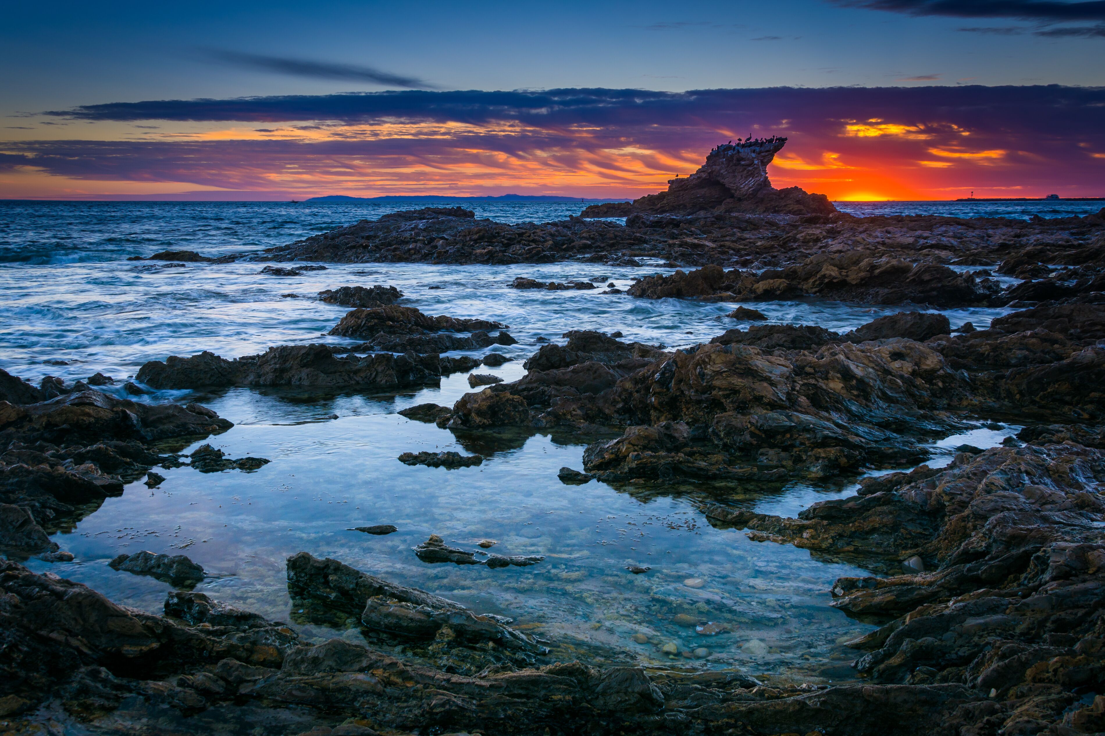 Tide pools at sunset, at Little Corona Beach, in Corona del Mar,