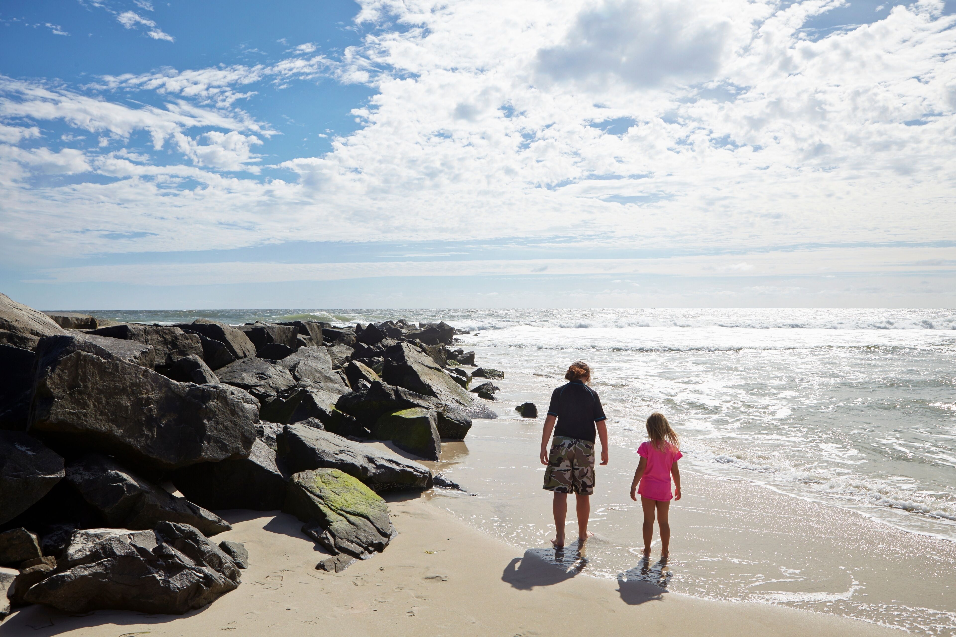 Children walking on beach, Beach Haven, New Jersey, USA