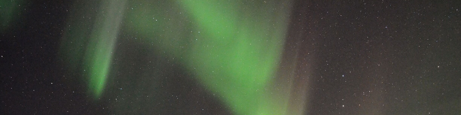 I'm not sure I want to share this tip because it's such a perfectly kept secret, but in the teeny, remote "town" of Reykir (there's really almost nothing there), is a little hostel that was nearly empty while I was there. Behind the hostel are two natural hot spring-fed pools on the edge of the ocean. Really basic accommodation, but there's a full kitchen and the pools are worth the stay. This is where I first saw the northern lights! #iceland #northernlights #hostel #hotspring