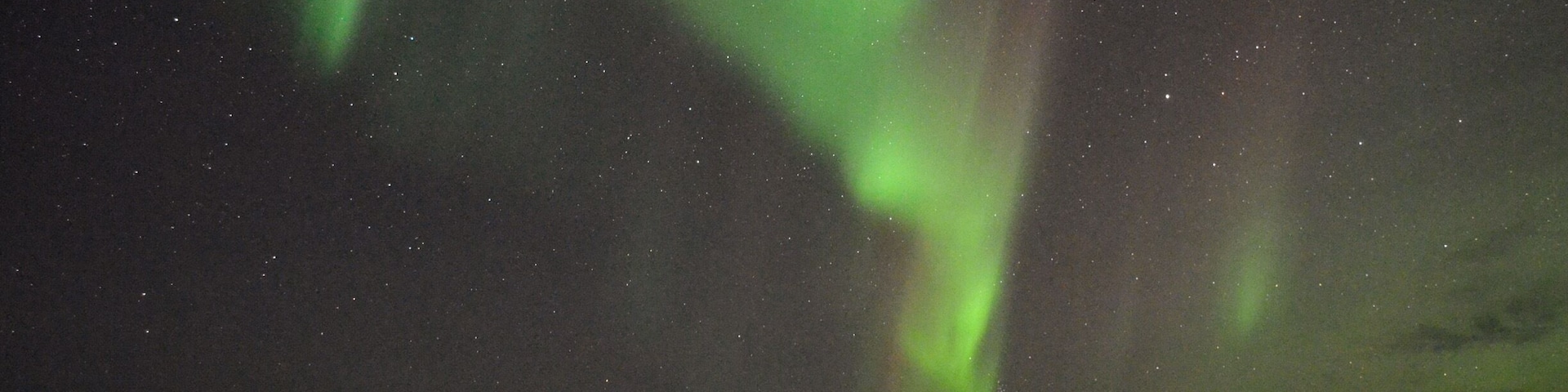 I'm not sure I want to share this tip because it's such a perfectly kept secret, but in the teeny, remote "town" of Reykir (there's really almost nothing there), is a little hostel that was nearly empty while I was there. Behind the hostel are two natural hot spring-fed pools on the edge of the ocean. Really basic accommodation, but there's a full kitchen and the pools are worth the stay. This is where I first saw the northern lights! #iceland #northernlights #hostel #hotspring