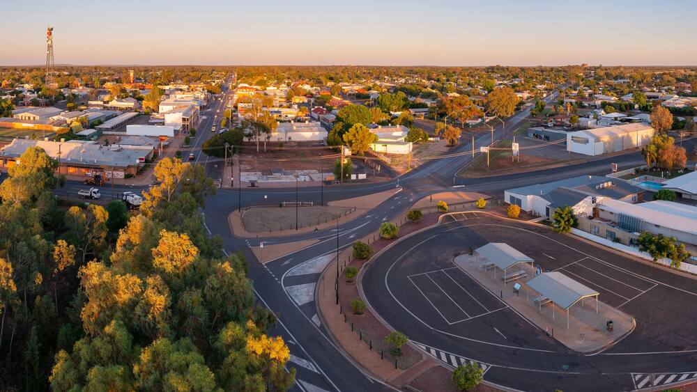 Panoramic aerial view of a regional town in early morning light
