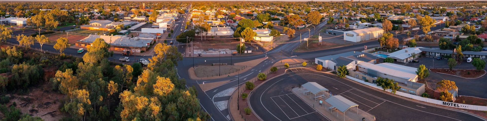 Panoramic aerial view of a regional town in early morning light