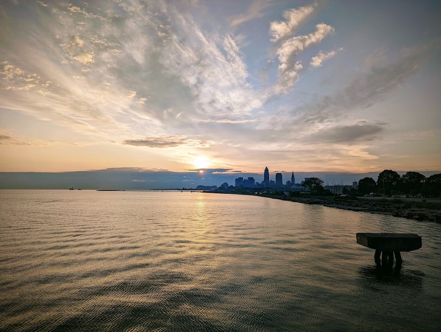 Sunset over Cleveland skyline with Lake Erie.