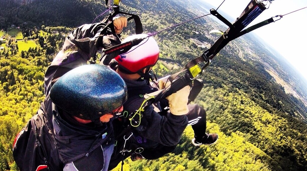 Fly tandem and go paragliding off of Poo Poo Point in Issaquah, WA. I went with Seattle Paragliding. They were great in prepping you and making sure you have a great time. If you're feeling brave ask for "Drew" and he'll do some parachute acrobatics (definitely not for the faint of heart or weak of stomach). Try to choose a sunny day and go around 4-5pm for the best winds.