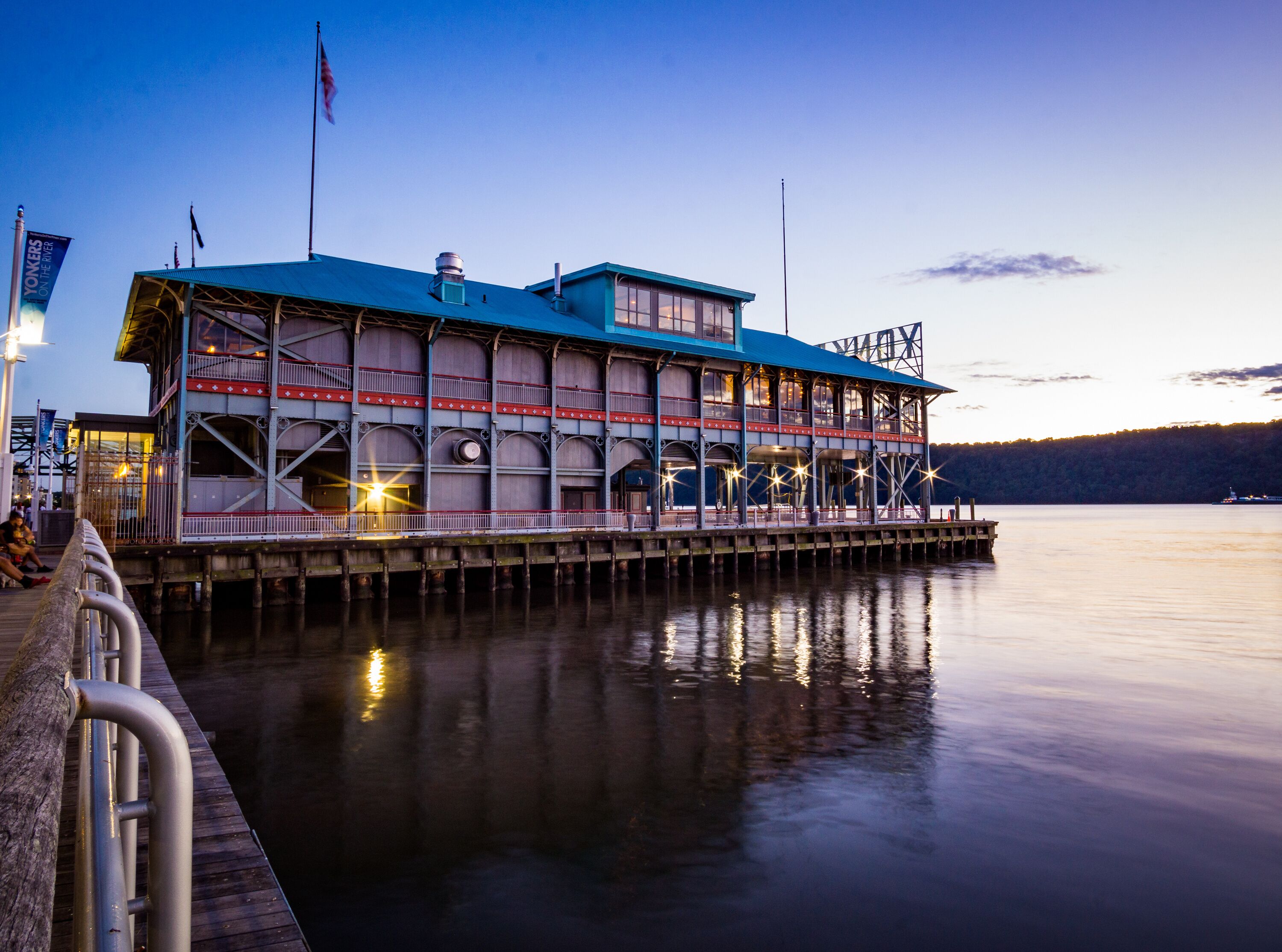 Yonkers, NY - Aug 13, 2022 Landscape view of the iconic Yonkers Recreation Pier, located at the foot of Main Street in the Downtown Waterfront District.