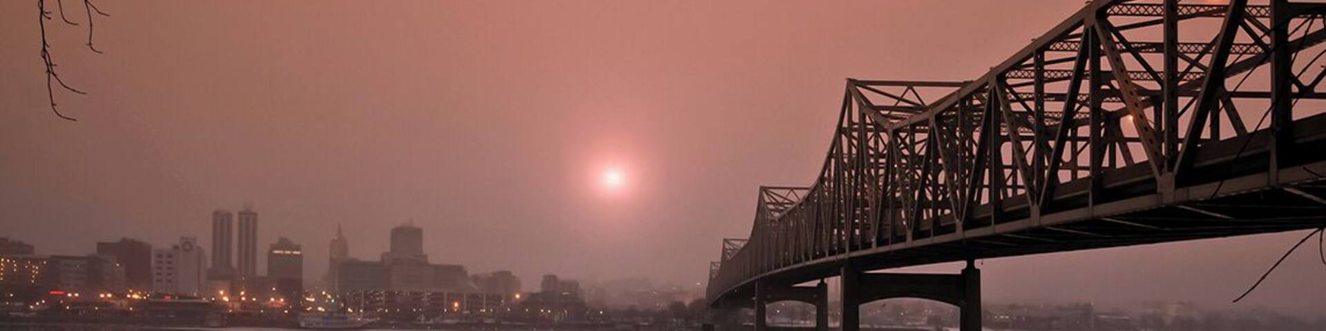 Rising Sun in Winter *A Popular Landmark*
#Murray Baker Bridge
#Peoria
#Chicago
#Illinois
#USA
#Sunrise
#Landscape
This location is the highest crime area in Peoria, actually I put myself in high risk while capturing this photo. That day I arrived this place at 5am in early morning purposely waited for sunrise, the temperature was so cold and below zero. A patrol car suddenly stopped me, the police officer asked me to leave this place immediately. I told the police officer "Please allow me to take at least one sunrise photo, I spent 3 hours drove from my home to here". Ended up the police officer accompany me for protection till I done, really thanks to the police officer :) Rising sun at dawn in winter, photo captured in a freezing cold morning under Murray Baker Bridge, Peoria Illinois USA.
Photo Licensed by iLOVEnature's Photography Inspiration l All rights reserved