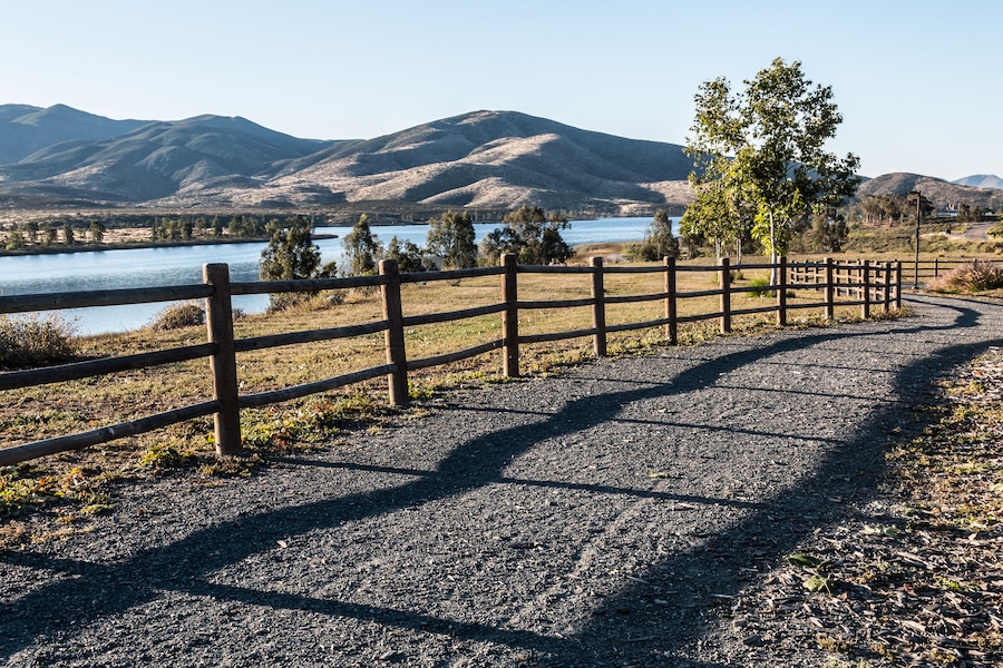 Pathway, trees, lake and mountains at Mountain Hawk Park in Chula Vista, California. ; Shutterstock ID 408255850