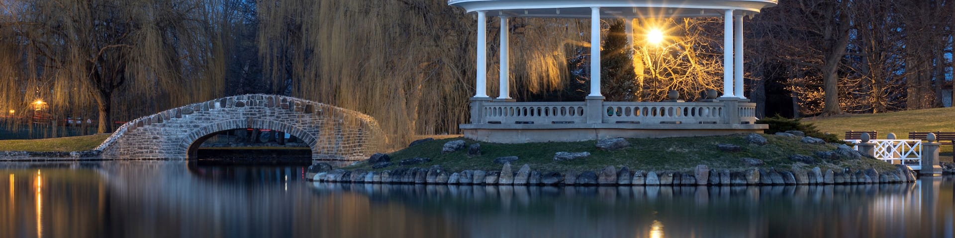Night Closeup View of Hiawatha Lake Footbridge and Gazebo in Onondaga Park, Known Locally as Central Park in Syracuse, New York - One of the Most Visited Travel Destinations in Upstate New York.