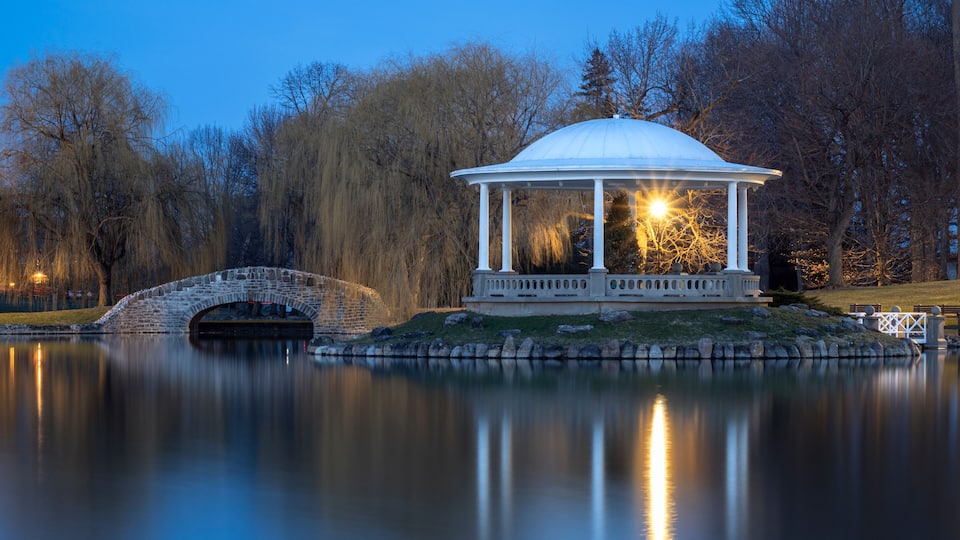 Night Closeup View of Hiawatha Lake Footbridge and Gazebo in Onondaga Park, Known Locally as Central Park in Syracuse, New York - One of the Most Visited Travel Destinations in Upstate New York.