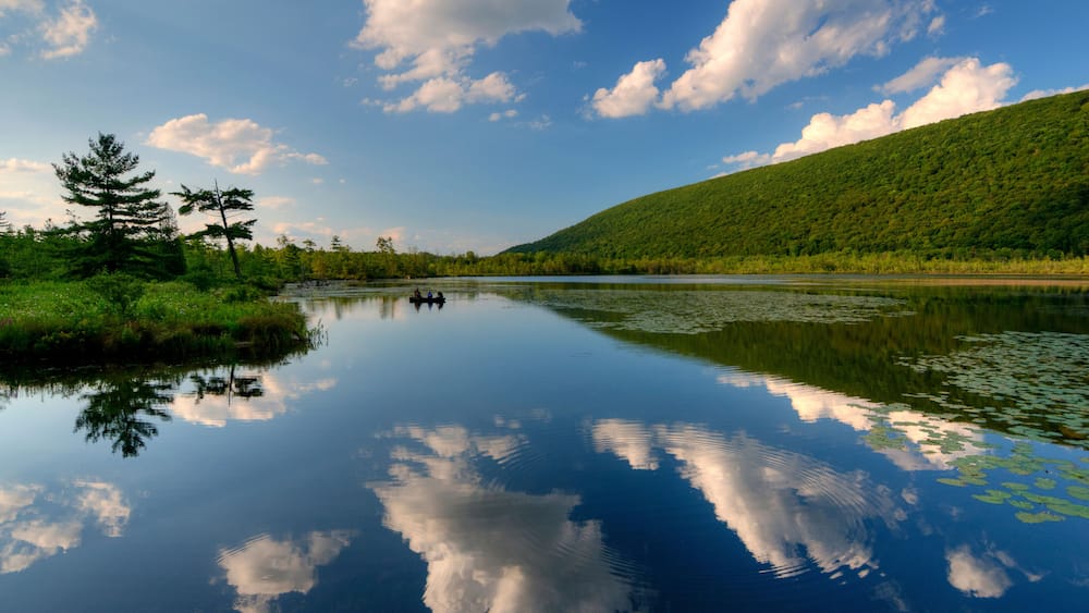 USA, New York State. Clouds reflected in Labrador Pond