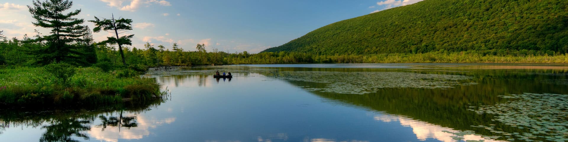 USA, New York State. Clouds reflected in Labrador Pond