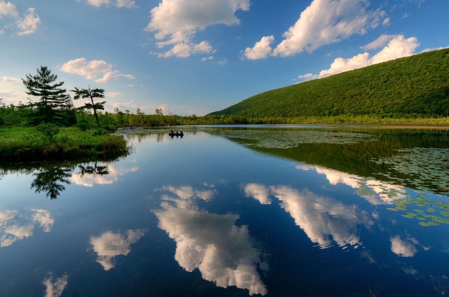 USA, New York State. Clouds reflected in Labrador Pond