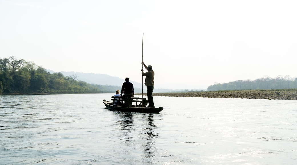 A boat trip on a silver shining river in Chitwan National Park