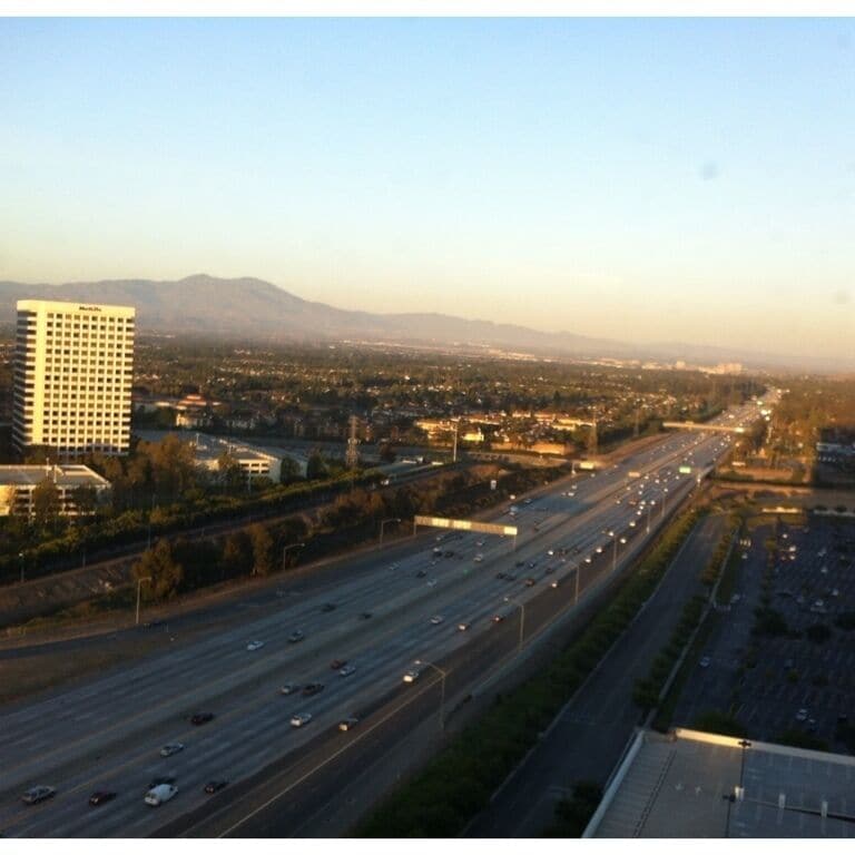405 freeway slicing a path through Irvine, looking southbound, which is actually east at this point, just past Jamboree Rd. 