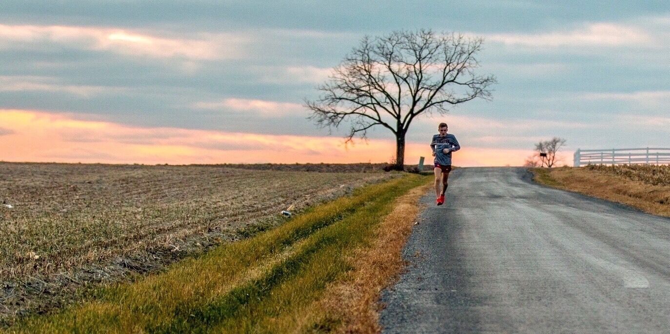 A lone runner puts in his miles.