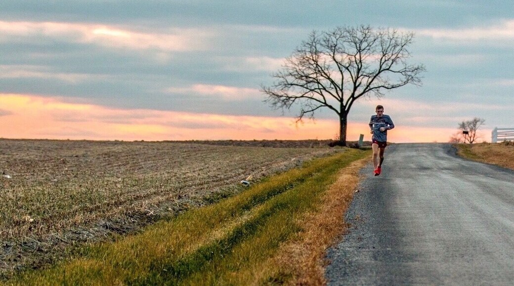 A lone runner puts in his miles.